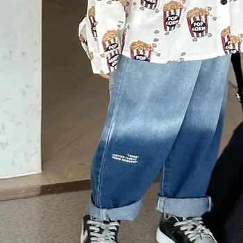 Весна 2023 г. Новая линия Мужские джинсы для малышей Модная повседневная детская одежда Свободные штаны для бега на открытом воздухе Младенцы 3-14 лет